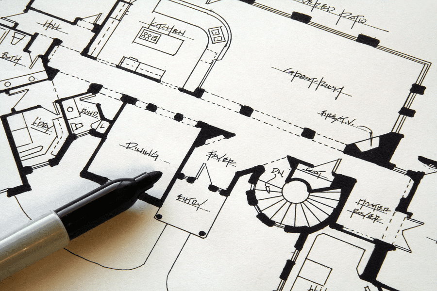 Architectural floor plan with pen
