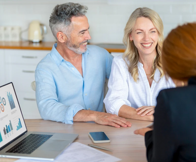 Couple consulting with professional advisor